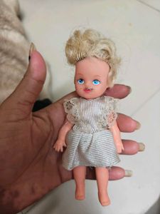 Vintage Doll with Silver Dress