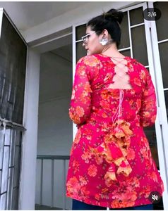 pink kurti with lining and lots of tussels