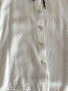 Chic White Blouse with Black Ribbon Detail🤍