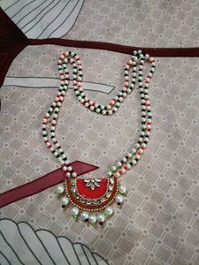 Elegant Beaded Necklace with Red Pendant