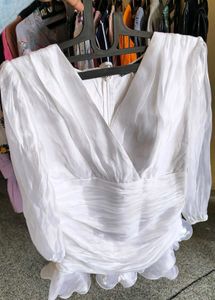 Elegant White Ruffled V-Neck Top
