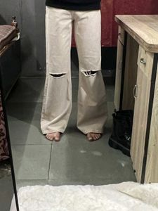 Trendy Beige Wide Leg Jeans with Rips