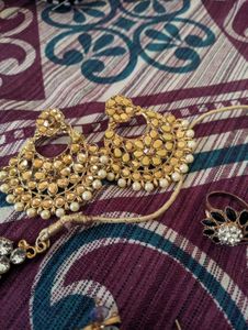 combo of 2 sets ,1 ring and a glass pendant