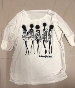 White Top with Black Pom-Pom Graphi
