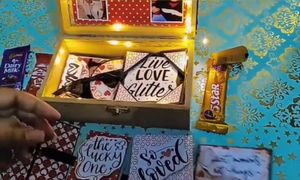 gift box with 10 cards inside and chocolte