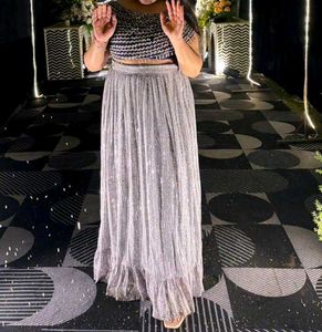 Sparkling bluse nd full sequence skirt