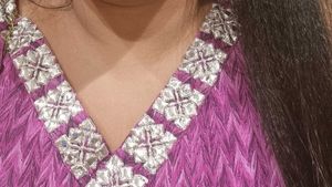 Elegant Purple Embroidered Gown