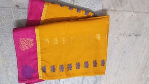 Yellow Saree With Pink Border