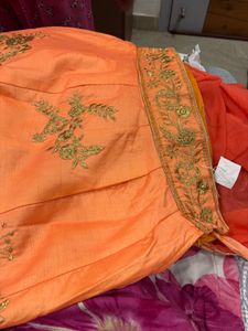 Stunning Orange Embroidered Lehenga Choli