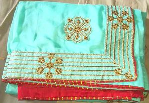 Beautiful Teal Saree with Gold Embroidery