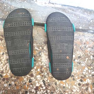 An almost new home slippers for little girls