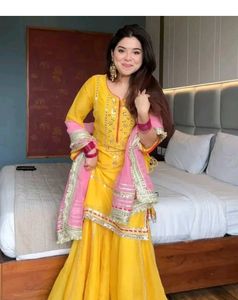 Vibrant Yellow Kurta Set with Pink Dupatta