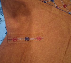 Elegant Rust Orange Kurta with Subtle Embroidery