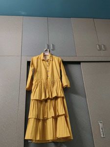 Elegant Yellow Tiered Gown