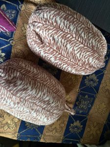 a pair of cushion
