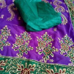 Embroidered Purple Saree with Green Blouse