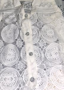 A Net Jacket With Button Closure