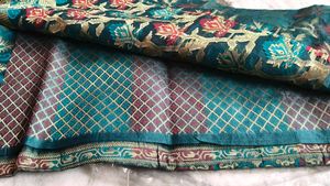 Elegant Teal Floral Brocade Saree