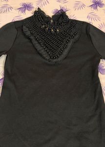 Elegant Black Blouse with Beaded Neckline