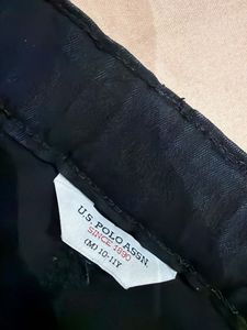 U.S. Polo Assn. Jeans and Maroon T shirt