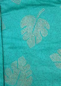 Beautiful Teal Saree with Gold Leaf Print