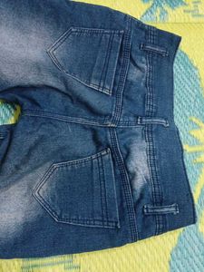 Ripped Blue Denim Jeans