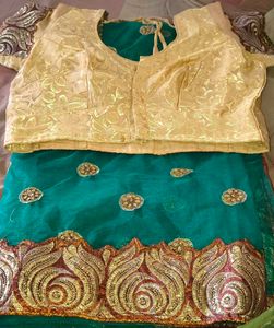 Elegant Teal Saree with Gold Blouse