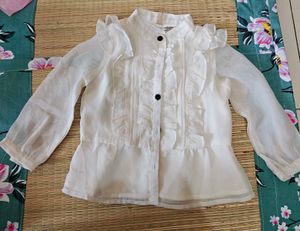Elegant White Ruffled Blouse