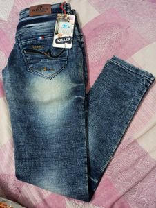 Distressed Blue Denim Jeans