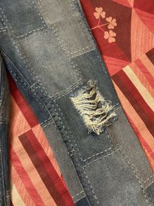 Patchwork Distressed Denim Jeans