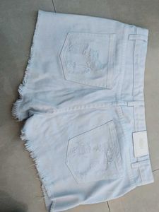 Distressed White Denim Shorts