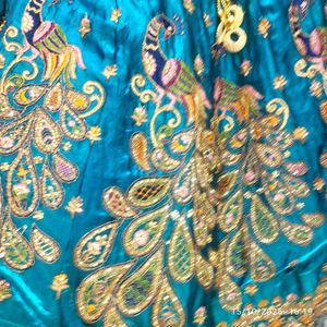 Stunning Teal Peacock Embroidered Lehenga Choli