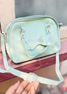 Mint Bow Accent Sling Bag