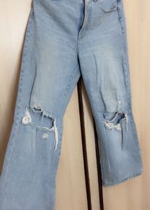 Ripped Light Wash Denim Jeans
