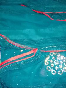 Stunning Embellished Teal Saree
