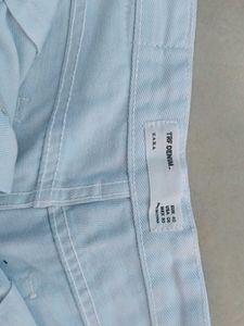Distressed White Denim Shorts