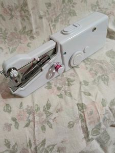Hand Held Sewing Machine