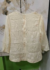 Elegant Beaded Cream top