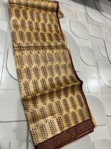Elegant Yellow Saree with Maroon Border