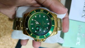 Luxury Gold & Green Rolex Watch
