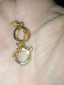 Gold Dangle Earrings with Intricate Design