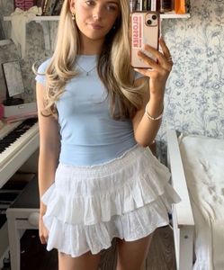 Eyelet ruffle mini skirt 🌻