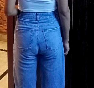 Distressed Light Wash Denim Jeans