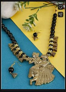 Elegant Gold-Toned Radha Krishna Necklace Set