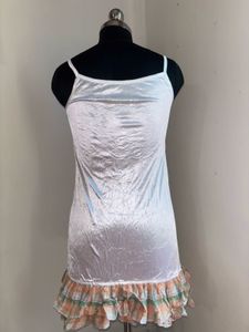 White Slip with Ruffled Hem