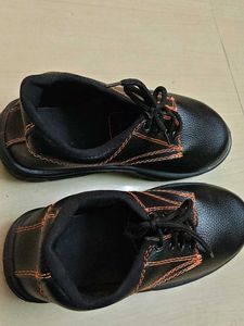 Black Shoe with Orange Stitching