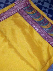 Vibrant Yellow Saree with Ornate Border