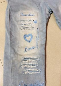 Light Wash Distressed Jeans with Heart Detail