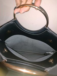 Chic Black Clutch with Gold Ring Detail