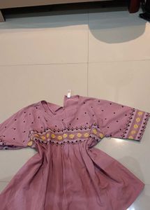 Embroidered Peplum Top